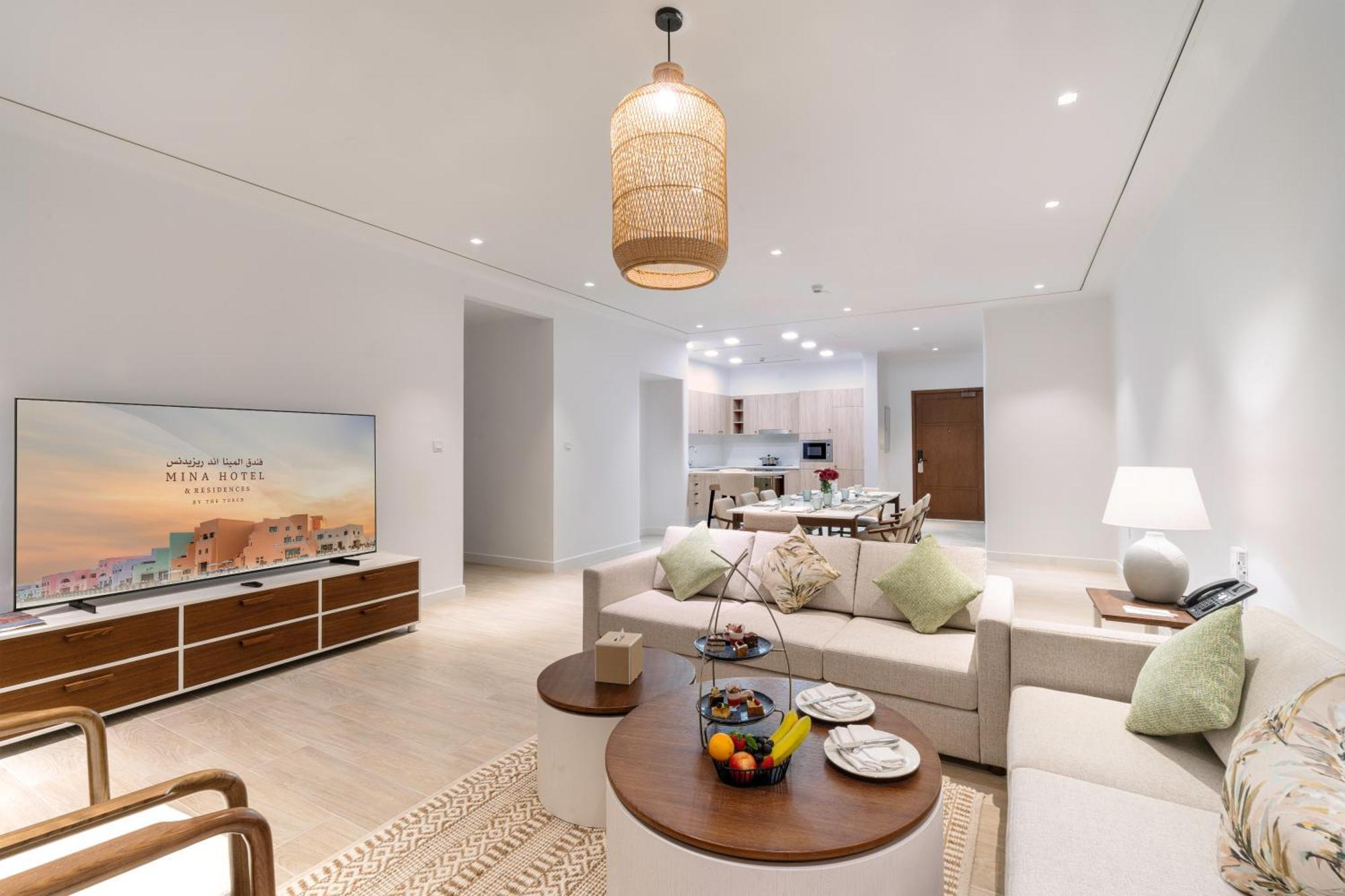 Mina Hotel And Residences By The Torch Doha Ngoại thất bức ảnh A living room at the Ritz-Carlton, DIFC