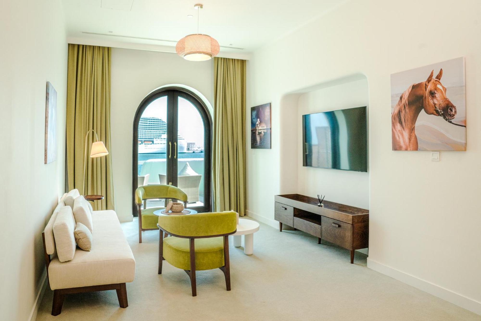 Mina Hotel And Residences By The Torch Doha Ngoại thất bức ảnh A living room at the hotel