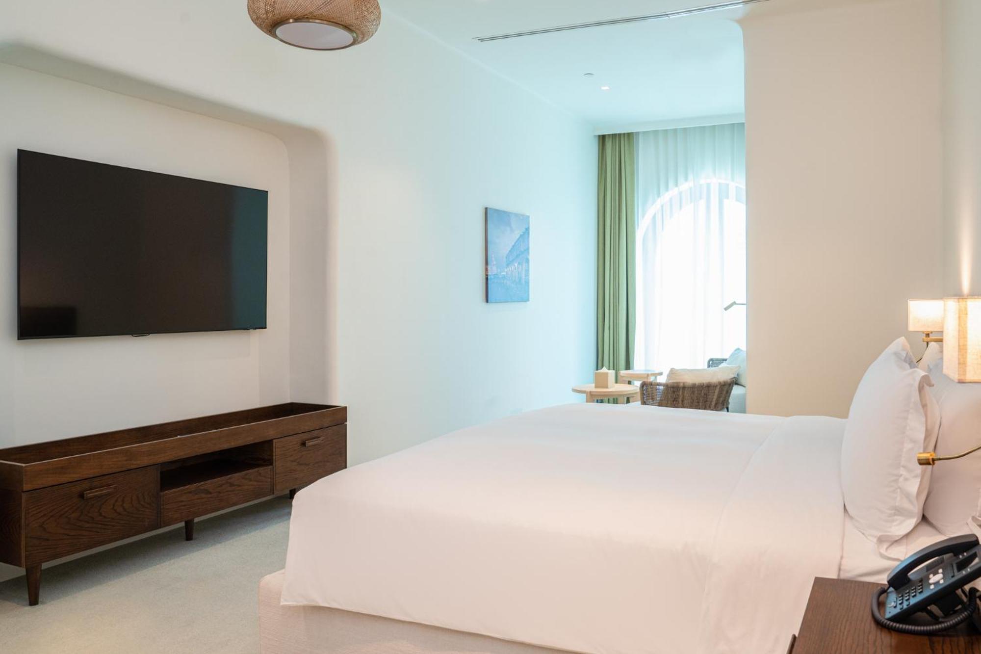 Mina Hotel And Residences By The Torch Doha Ngoại thất bức ảnh A bedroom at the hotel